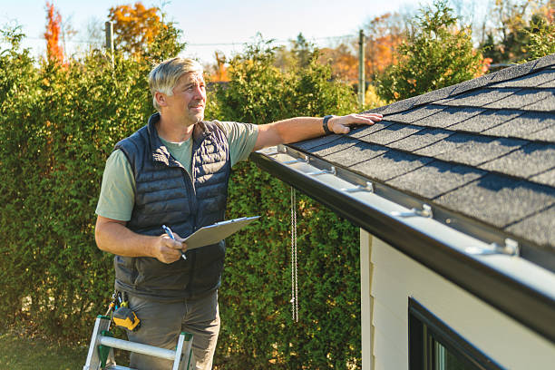 Professional Hail Damage Roof Repair technician working in Brisbane, CA